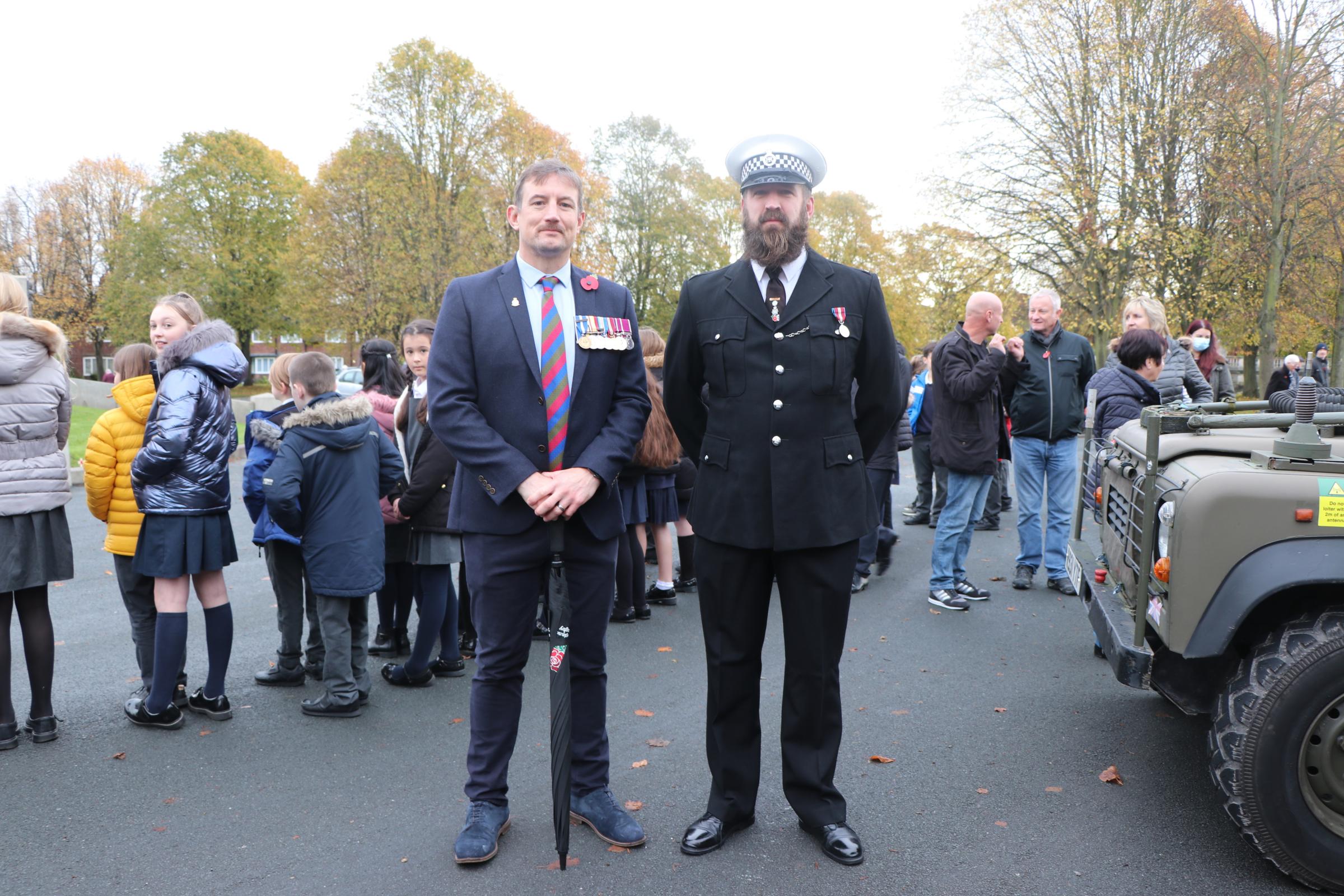 Retired W01 (RSM) Simon Hopkins (left) and Constable 6727 Mike Almond attending the service in Port Sunlight