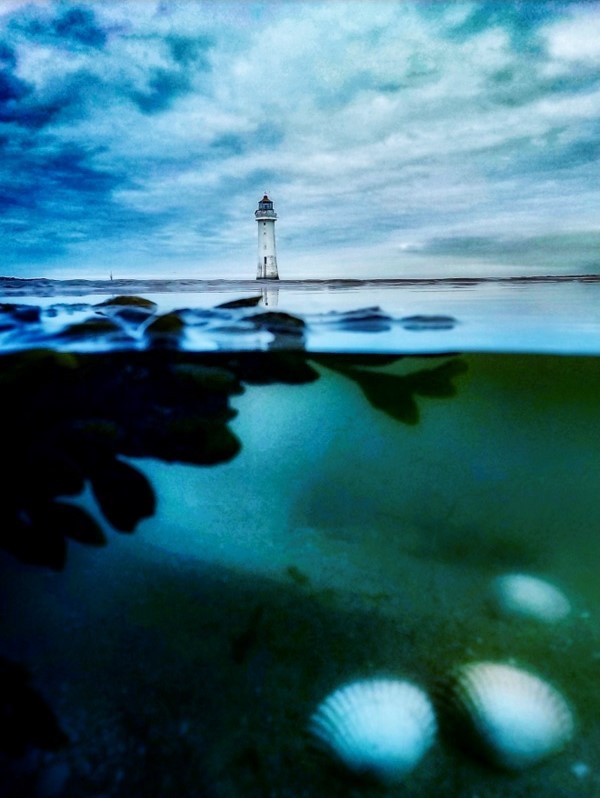 An over under shot of the lighthouse in New Brighton