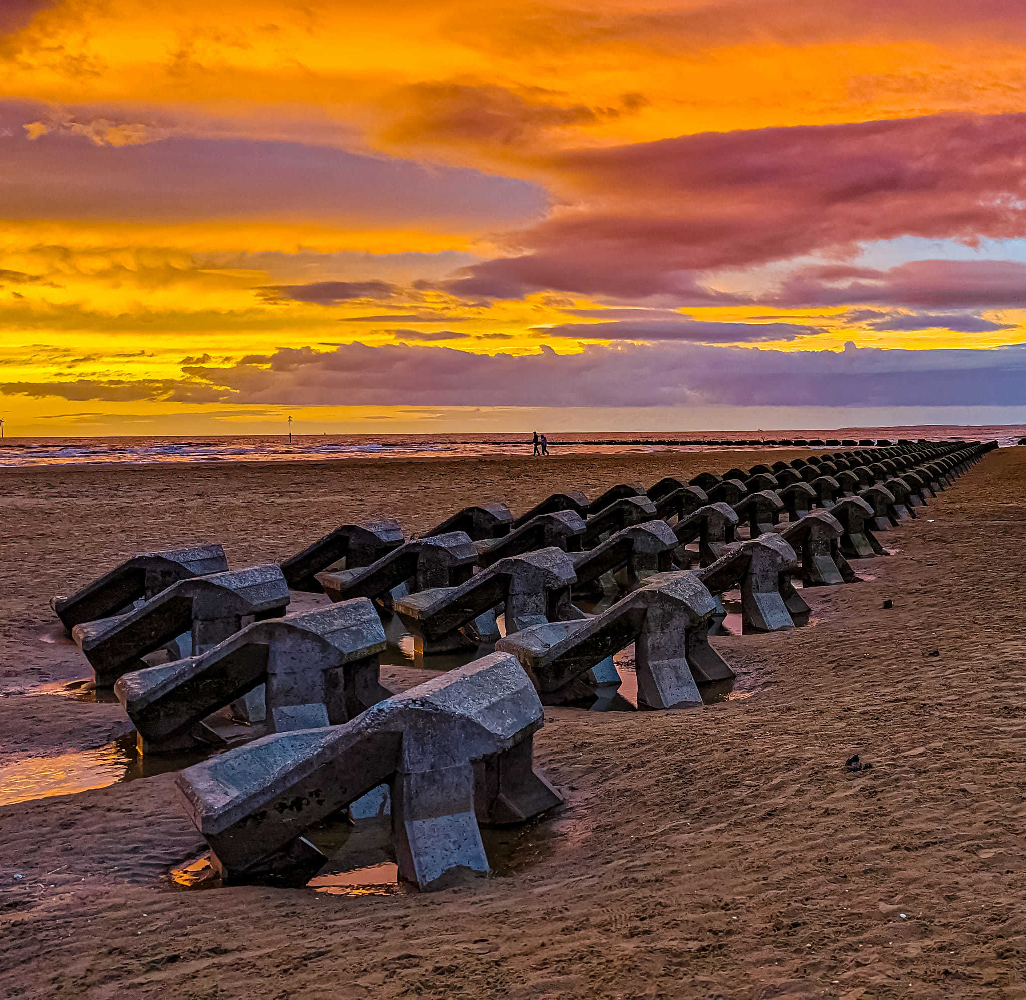 Colourful skies over Wallasey beach by Kimberley Phillips