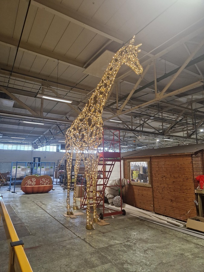 Finishing touches are being added to giant pea-lit animal lanterns.