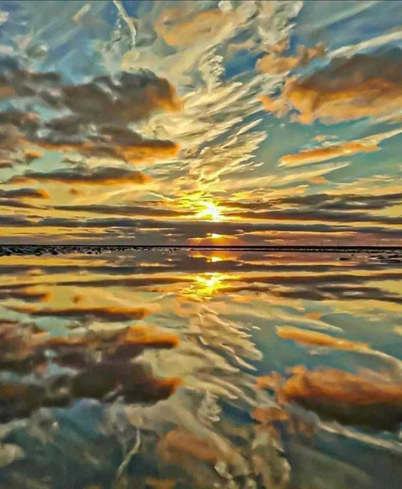 Sky reflections by Kimberley Phillips