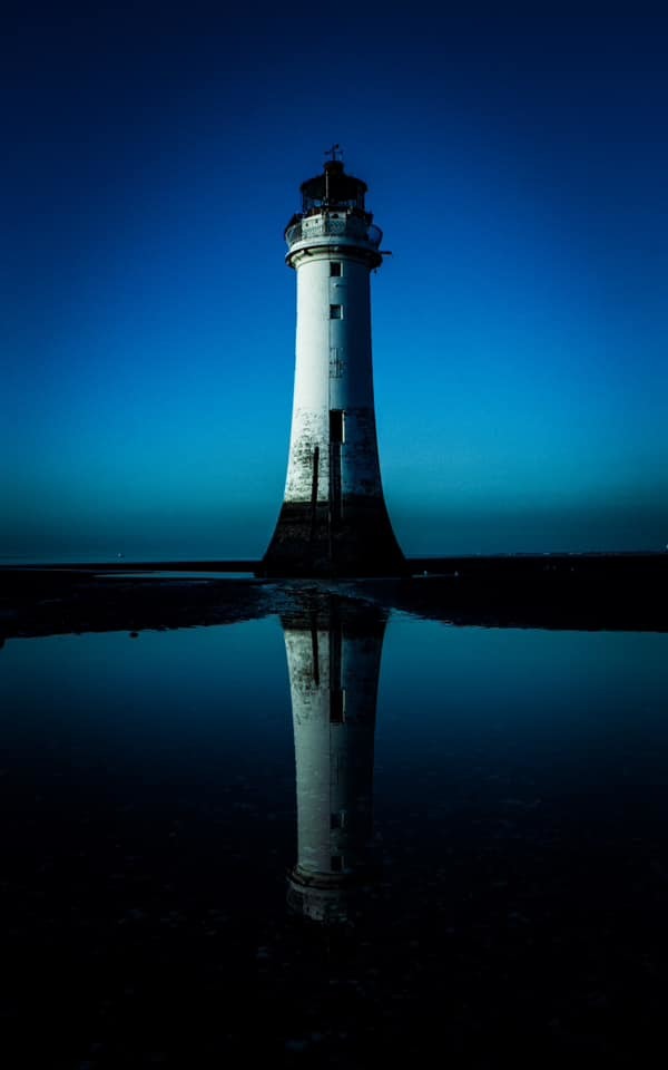 Lighthouse symmetry by Tracey Rennie