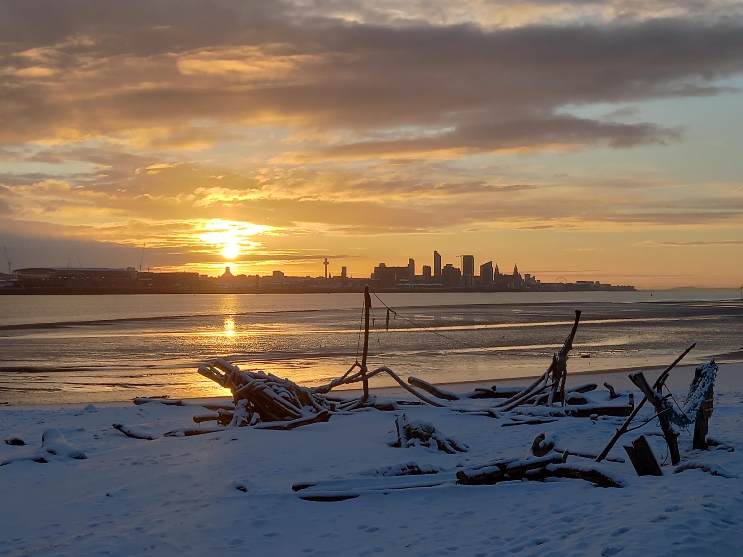 Sunrise on a snow beach