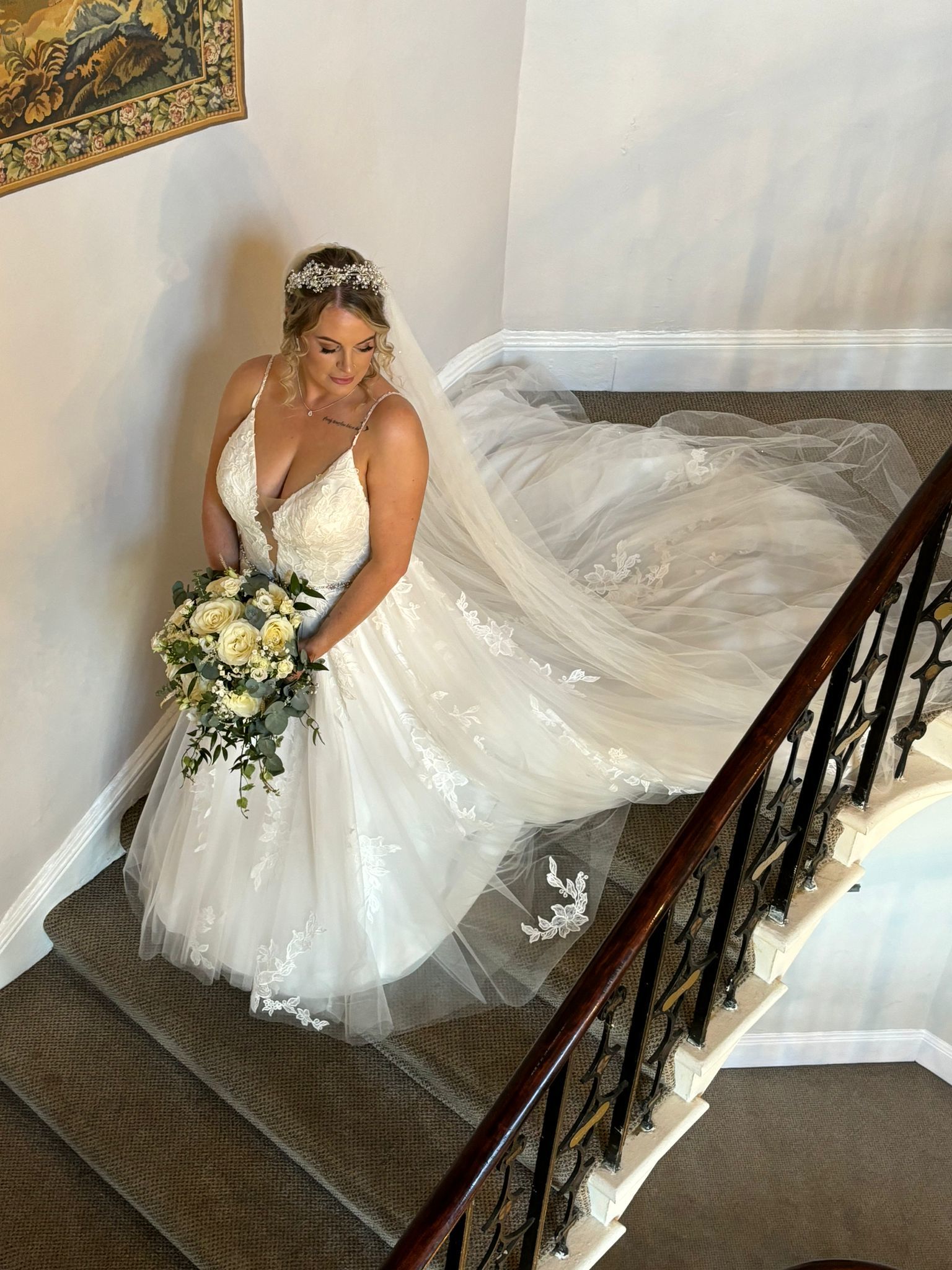 Sophie wore an ivory dress and her bridesmaids were in sage green