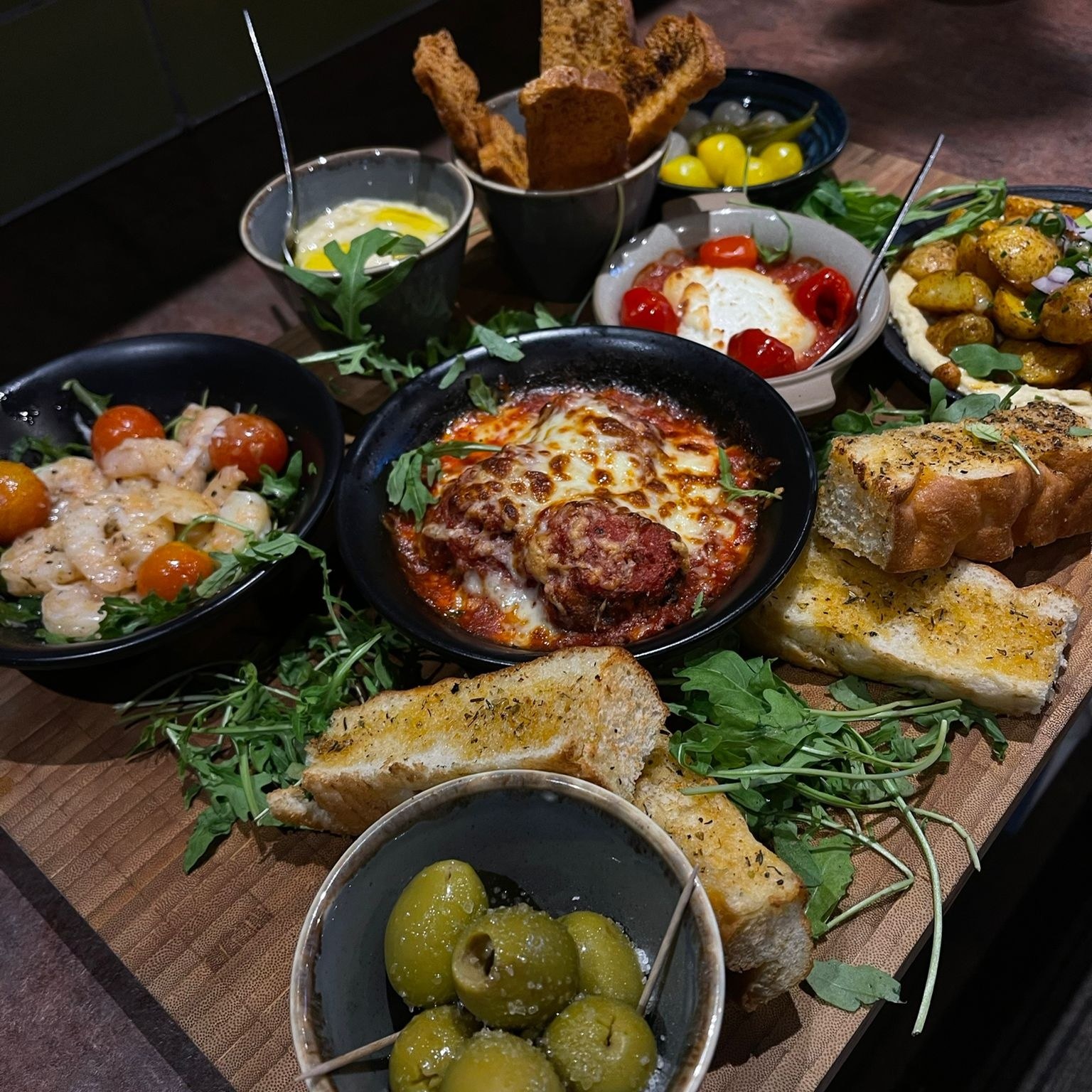 Cory and his team serve sharing boards to hungry guests