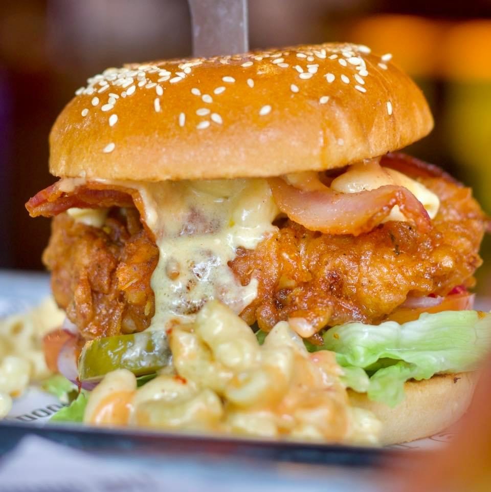 Fried chicken burger with mac n cheese and smoked chipotle