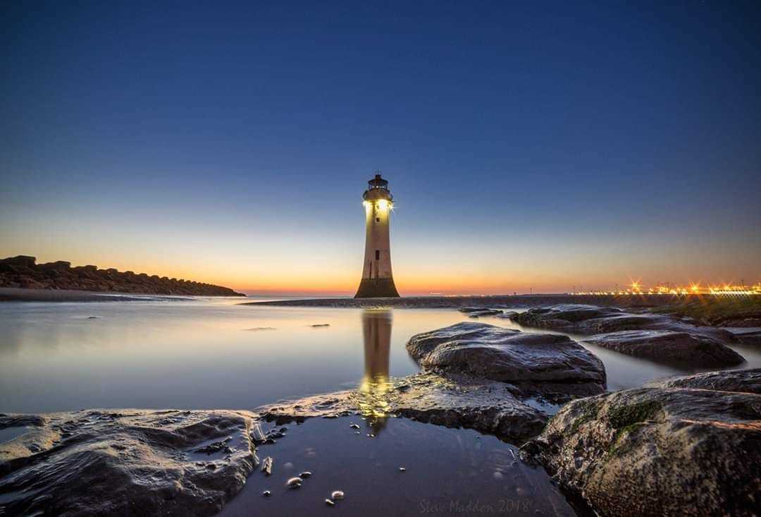 The lighthouse at sunset by Steve Madden